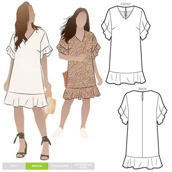 Stylish Pixie shift dress sewing pattern with short flounce sleeves, hem flounce, and a ‘V’ neck, designed for an easy fit and suitable for luxurious fabrics like silk and crepe