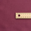 Lightweight Plain Plum 100% linen fabric with tight weave and fine texture, ideal for summer dresses, tops, skirts, and pants.
