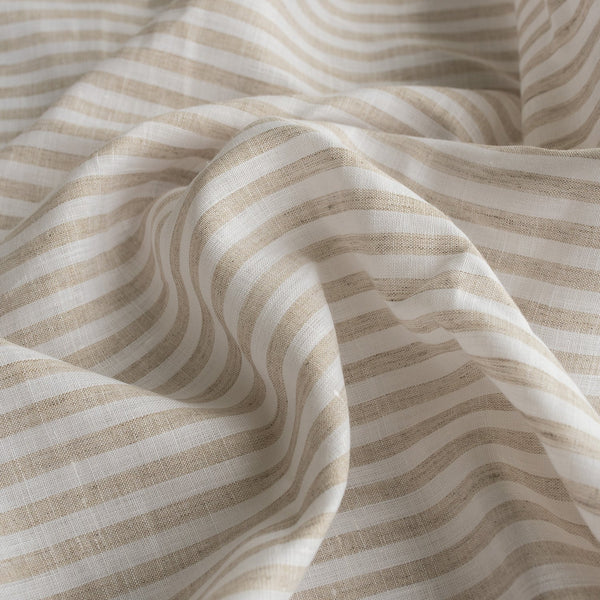 Timeless Sandalwood Stripes linen fabric in neutral tones, ideal for both fashion and home décor projects.