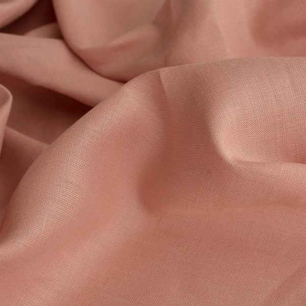 Lightweight Vintage Rose linen fabric with a natural wrinkling texture, ideal for creating elegant summer dresses and tops.