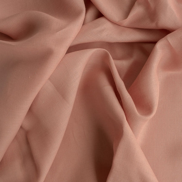 Lightweight Vintage Rose linen fabric with a natural wrinkling texture, ideal for creating elegant summer dresses and tops.