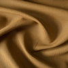 Rustic Spiced Clay linen fabric with a natural texture and medium drape, perfect for creating timeless fashion pieces.