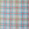 Colorful Carnival Check Linen Fabric featuring a mix of aqua, green, and red threads on white, suitable for a variety of light and airy garments.