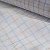 Yarn-dyed check pattern linen fabric in earth and sky hues, ideal for elegant and natural clothing.