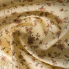 Delicate floral print on lightweight Summer Floral Garden linen fabric, ideal for crafting elegant summer wardrobe pieces.