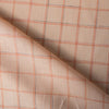 Subtle check Peach Puff 100% linen fabric with variegated thread, ideal for creating elegant and versatile garments