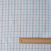 Summer Blues Check 100% Linen Fabric featuring fine blue checks on a white background, ideal for a variety of summer garments