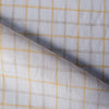 Creamy Lemon Oatmeal Check Linen Fabric, featuring sunshine yellow and earthy checks on white linen, with a fine weave for a soft feel and elegant drape.