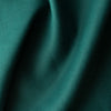 Emerald Depths 100% Linen Fabric, rich deep green color, luxurious natural texture, ideal for sophisticated designs.