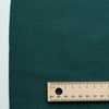 Emerald Depths 100% Linen Fabric, rich deep green color, luxurious natural texture, ideal for sophisticated designs.