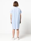 Lady wearing a blue dress made with the Blaire Dress Sewing Pattern – Shirtmaker style with shirt tail and inset pockets.