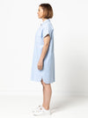 Lady wearing a blue dress made with the Blaire Dress Sewing Pattern – Shirtmaker style with shirt tail and inset pockets.