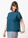 Lady wearing teal linen top made using Bonnie Woven Tops Multi-Size Sewing Pattern