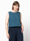 Lady wearing teal linen top made using Bonnie Woven Tops Multi-Size Sewing Pattern