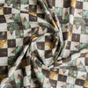 Nature-inspired Botanical Patchwork Linen Blend Fabric with green, beige, and brown leaf patterns