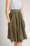 Brumby skirt sewing pattern, featuring gathered designs with deep scoop pockets and an exposed zipper