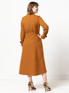 Sophisticated Christina Woven Dress pattern with long sleeves, turn back cuffs, and a mid-body fitted yoke, designed for a refined look