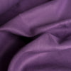 Luxurious Dark Purple Linen Fabric with a soft feel and good drape, enhancing sewing projects from casual loungewear to chic jumpsuits.