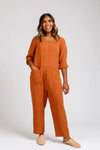 Durban multi-size sewing pattern featuring mix and match jumpsuit & romper styles with various necklines, sleeves, and leg cuts, suitable for intermediate skill levels.