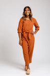 Durban multi-size sewing pattern featuring mix and match jumpsuit & romper styles with various necklines, sleeves, and leg cuts, suitable for intermediate skill levels.