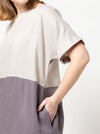 close up view of women wearing linen eme dress made using Eme Dress sewing pattern by Style Arc, featuring a loose-fitting cocoon shape, perfect for summer, and suitable for linen, rayon, silk, cotton, and fine wool fabrics.