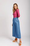 Flint sewing pattern for wide leg cropped pants or shorts with crossover closure, suitable for light to medium weight fabrics, great for beginner sewers.