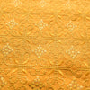 Luxurious golden mustard linen fabric with intricate embroidery and embellishments