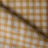 Honey yellow and white woven checks on lightweight Honey Gingham 100% Linen Fabric, with a smooth hand and subtle slubs