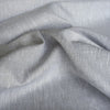 Chambray wave linen fabric with subtle slubs and a balance of grey and white threads