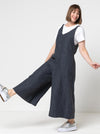 A comfortable Norman V-neck jumpsuit sewing pattern with deep armholes and wide legs, perfect for creating a chic and easy-to-wear garment.