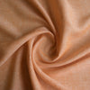 Yarn-dyed Orange Chambray 100% linen fabric in light orange, ideal for lightweight and stylish clothing.