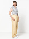 Spencer Woven Pant sewing pattern with wide leg design, cuffed hem, and detailed pockets, ideal for linen, wool, crepe, or gabardine fabrics.