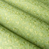 legant Sunny Lime Embroidered linen fabric with a chambray texture and green vine embroidery, ideal for sophisticated creations.