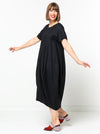 Contemporary Sydney Designer Dress sewing pattern featuring a full cocoon shape, high-low hemline, and engineered panels for an elegant drape, ideal for various fabrics