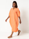 A chic, calf-length cocoon dress sewing pattern from the SYDNEY DRESS EXTENSION PACK, featuring multiple customization options for a personalized touch