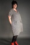 Twenties-inspired Factory Dress sewing pattern with pockets and rolled-up sleeves by Merchant & Mills.