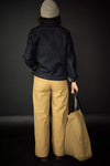 Merchant & Mills’ Omilie sewing pattern for sailor-inspired wide leg trousers with buttoned pockets.