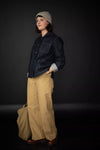 Merchant & Mills’ Omilie sewing pattern for sailor-inspired wide leg trousers with buttoned pockets.