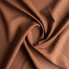 Rich, dark brown Tortoiseshell linen fabric, suitable for a range of stylish garments and cozy home textiles.