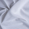 Classy White Slub linen fabric with a unique textural pattern, ideal for crafting airy and elegant garments.