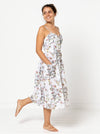 lady wearing floral dress made of Ariana Woven Dress Sewing Pattern - Fitted Bodice with Full Skirt