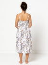 lady wearing floral dress made of Ariana Woven Dress Sewing Pattern - Fitted Bodice with Full Skirt