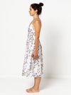 lady wearing floral dress made using Ariana Woven Dress Sewing Pattern - Fitted Bodice with Full Skirt