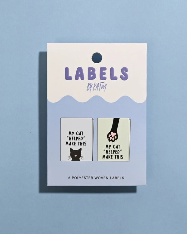 Pack of labels with humorous designs on a blue background