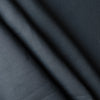 Close-up of darknavy blue linen fabric with folds