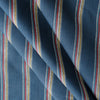 Bondi Beach Stripe linen fabric with vibrant stripes in deep blue, yellow, white, red, and light blue.