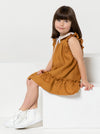 A child wearing dress made using Bonnie Kids Dress Sewing Pattern - A-line swing dress with frill hem and sleeves, Peter Pan collar, for kids ages 2-14, suitable for woven fabrics like linen, cotton, and rayon