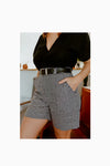 Lady wearing shortsin blach gingham made of Bottlebrush Pants and Shorts Sewing Pattern - High-Waisted Flared Pants and Mini Shorts