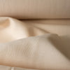 Buttermilk Cream 100% Linen Fabric, heavyweight with a fine weave, smooth finish, and soft drape, suitable for jackets, trousers, and home textiles.