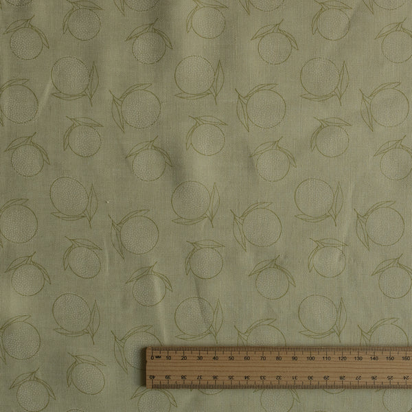 Citrus Sketch linen fabric in creamy green-beige with olive citrus line drawings, 140 GSM.